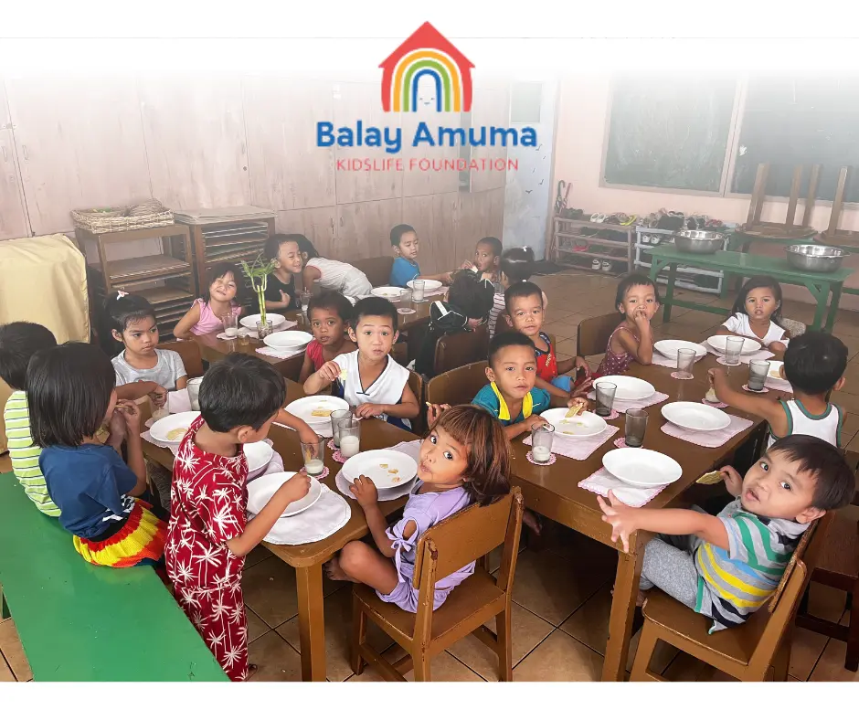 Children sharing a meal at the KidsLife Foundation